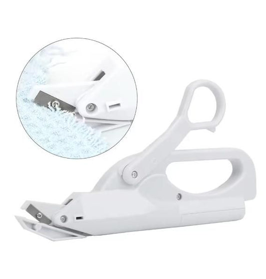 White shears with a close-up inset showing the blade on a white background